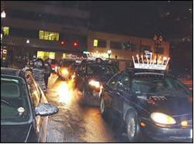 Rabbi Mendy Bukiet of Chabad of Bradenton displays a menorah on the roof of his 2003 Sonata, which will light up during Hanukkah.